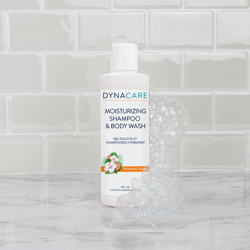 1386_1386_moisturizing-shampoo-and-body-wash_8oz_front-view_bubbles-and-bathroom-setting_72dpi_kyjkcu